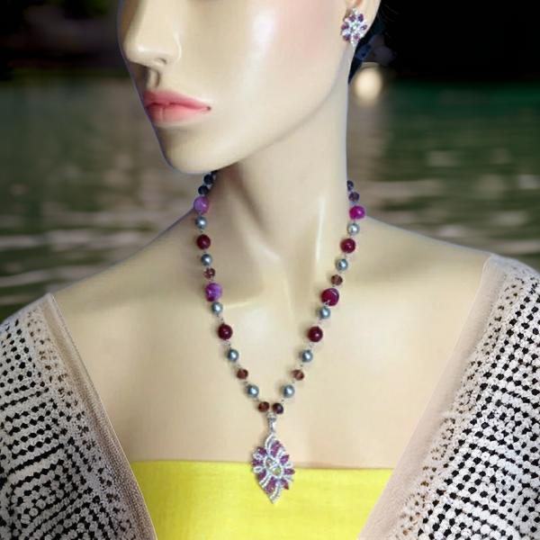 Luminent Shades of Magenta with Zircon Studded Pendant Necklace Set