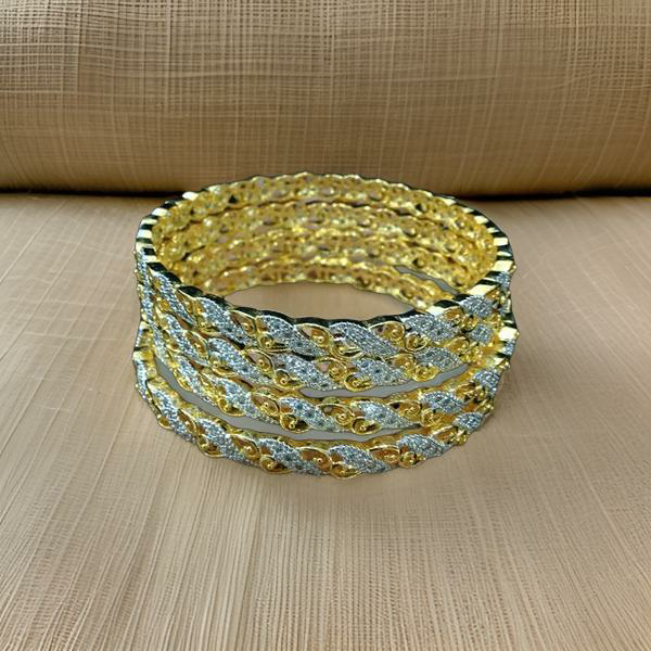 Waves of Gold and Crystal Bangles